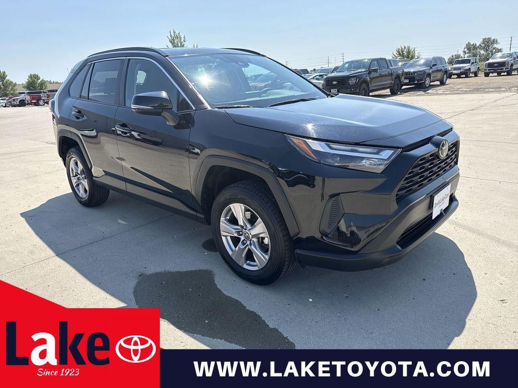 2025 Toyota RAV4 XLE in Midnight Black Metallic — front three-quarter view