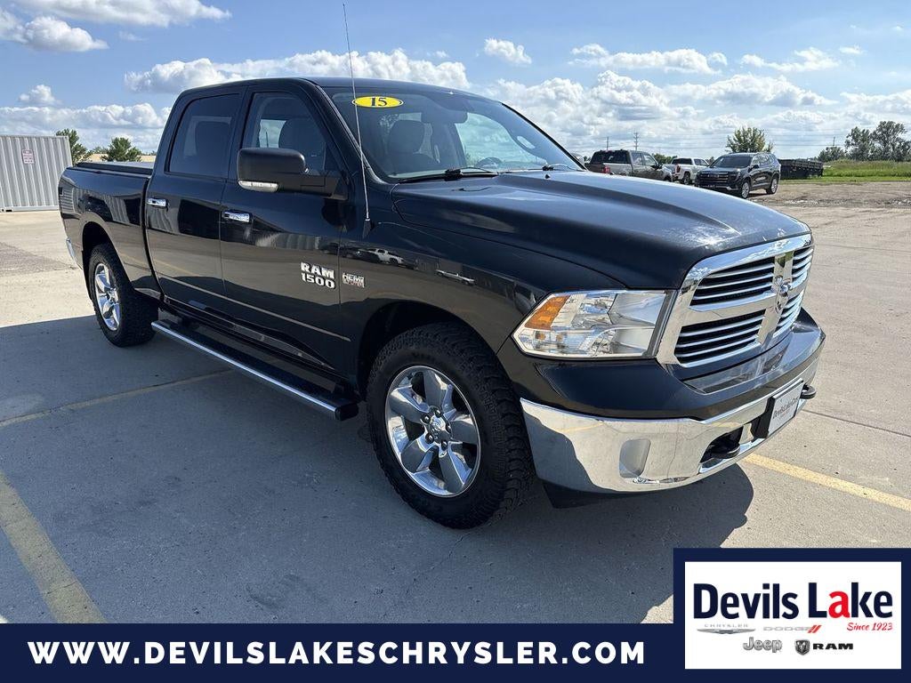 2015 RAM 1500 Big Horn in Black — front three-quarter view