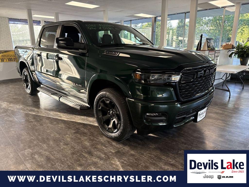 2026 RAM Ram 1500 RAM 1500 BIG HORN CREW CAB 4X4 5'7' BOX in Serrano Green Metallic — front three-quarter view