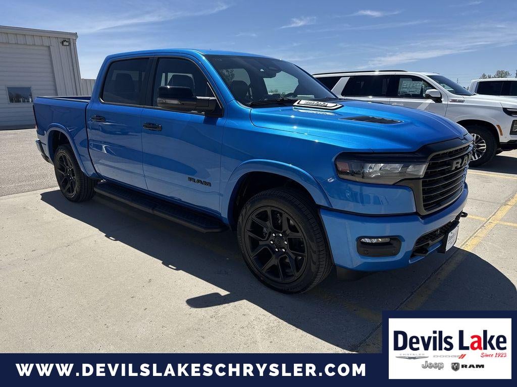 2026 RAM Ram 1500 RAM 1500 LARAMIE CREW CAB 4X4 5'7' BOX in Hydro Blue Pearlcoat — front three-quarter view