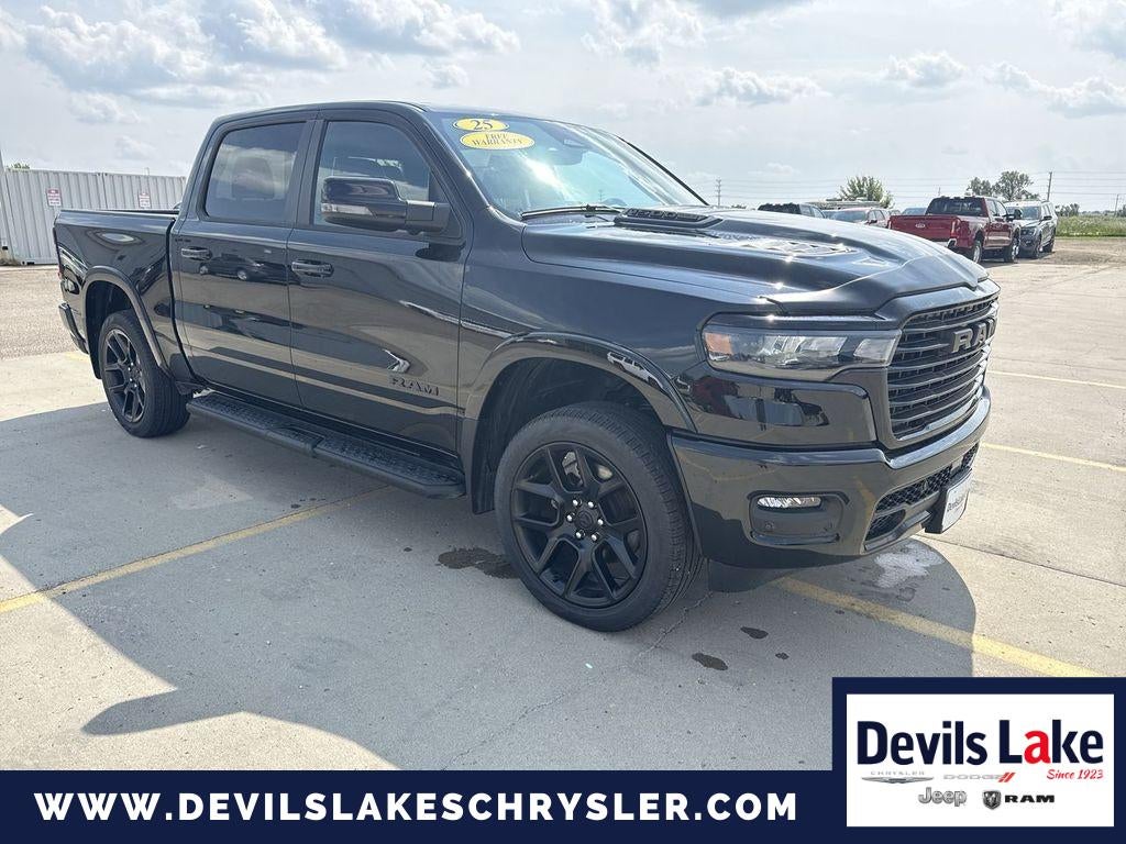 2025 RAM 1500 Laramie Crew Cab 4x4 5'7' Box in Diamond Black Crystal Pearlcoat — front three-quarter view