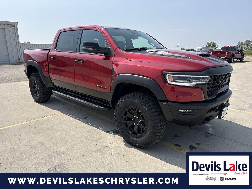 2026 RAM 1500 RHO in Molten Red Pearlcoat — front three-quarter view