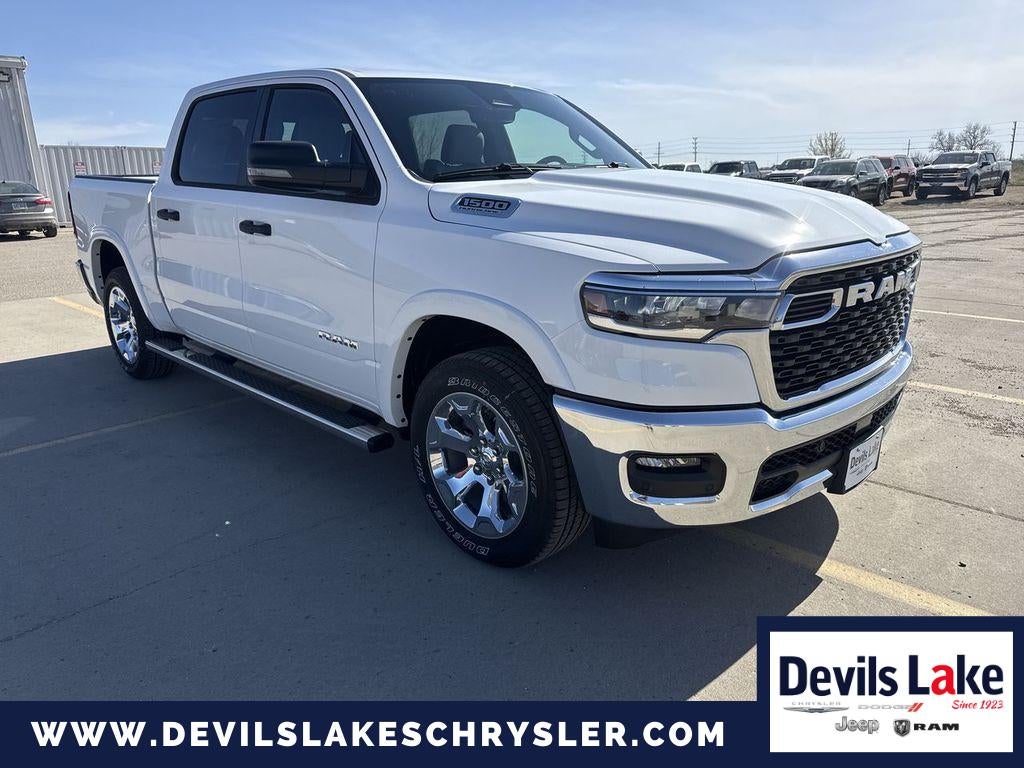 2026 RAM Ram 1500 RAM 1500 BIG HORN CREW CAB 4X4 5'7' BOX in Bright White Clearcoat — front three-quarter view