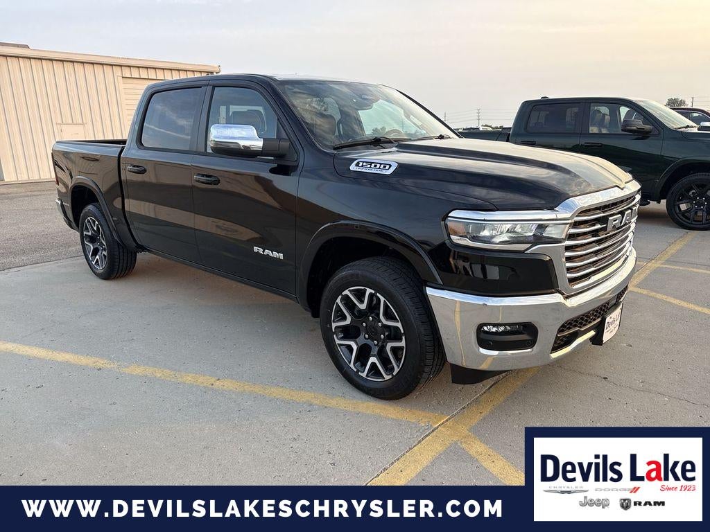 2026 RAM Ram 1500 RAM 1500 LARAMIE CREW CAB 4X4 5'7' BOX in Diamond Black Crystal Pearlcoat — front three-quarter view