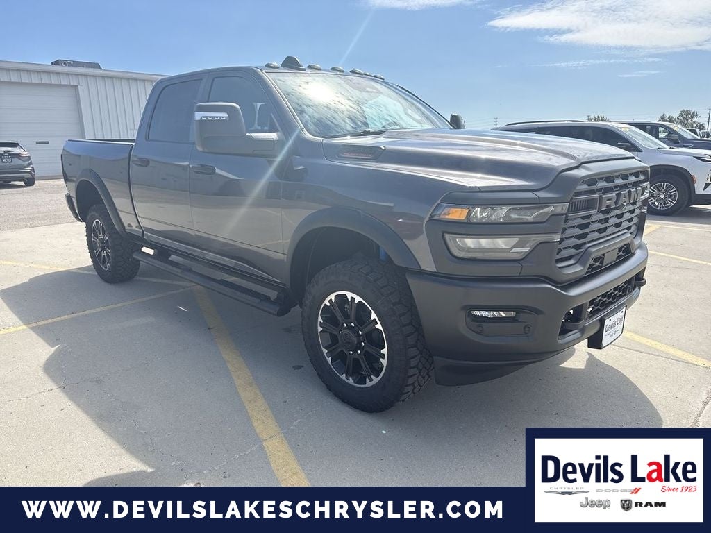 2026 RAM Ram 2500 RAM 2500 WARLOCK CREW CAB 4X4 6'4' BOX in Granite Crystal Metallic Clearcoat — front three-quarter view
