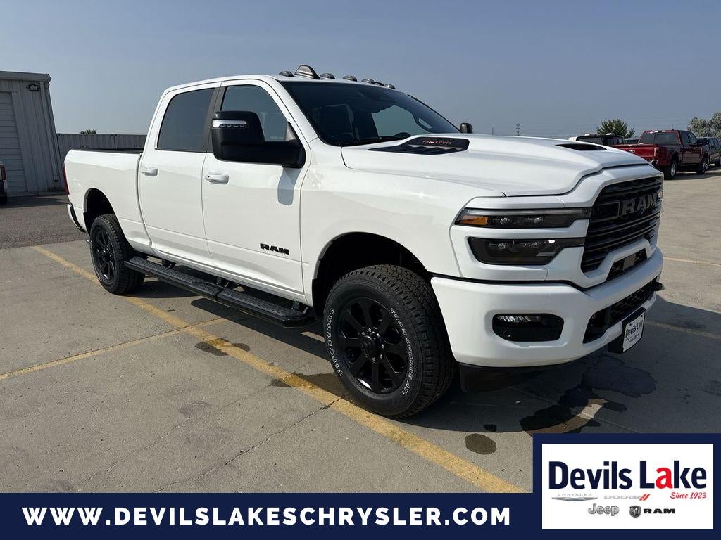 2026 RAM Ram 2500 RAM 2500 LARAMIE CREW CAB 4X4 6'4' BOX in Bright White Clearcoat — front three-quarter view