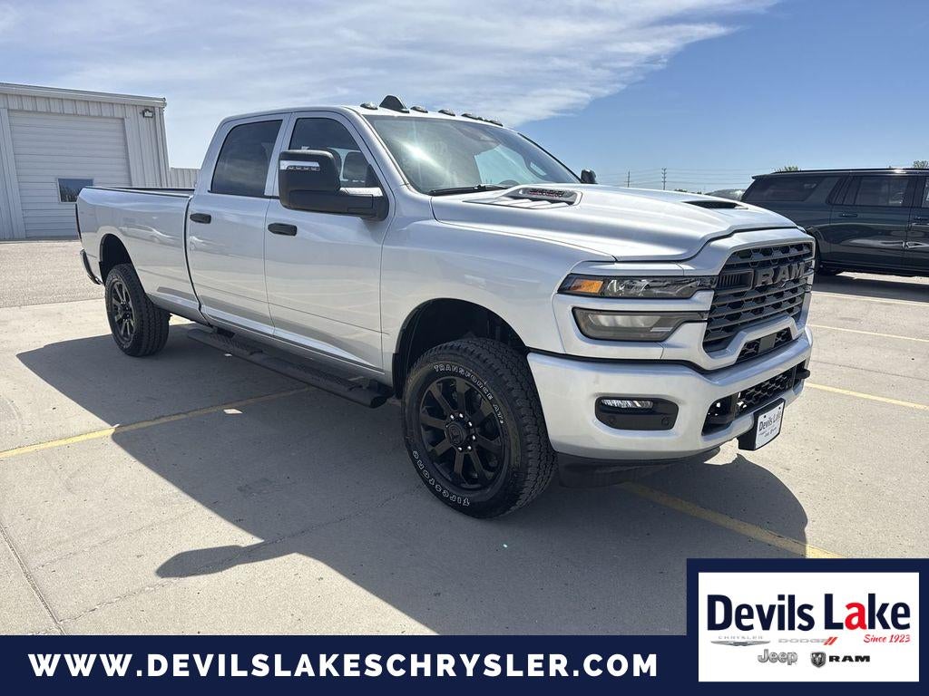 2026 RAM Ram 2500 RAM 2500 BLACK EXPRESS CREW CAB 4X4 8' BOX in Silver Zynith — front three-quarter view