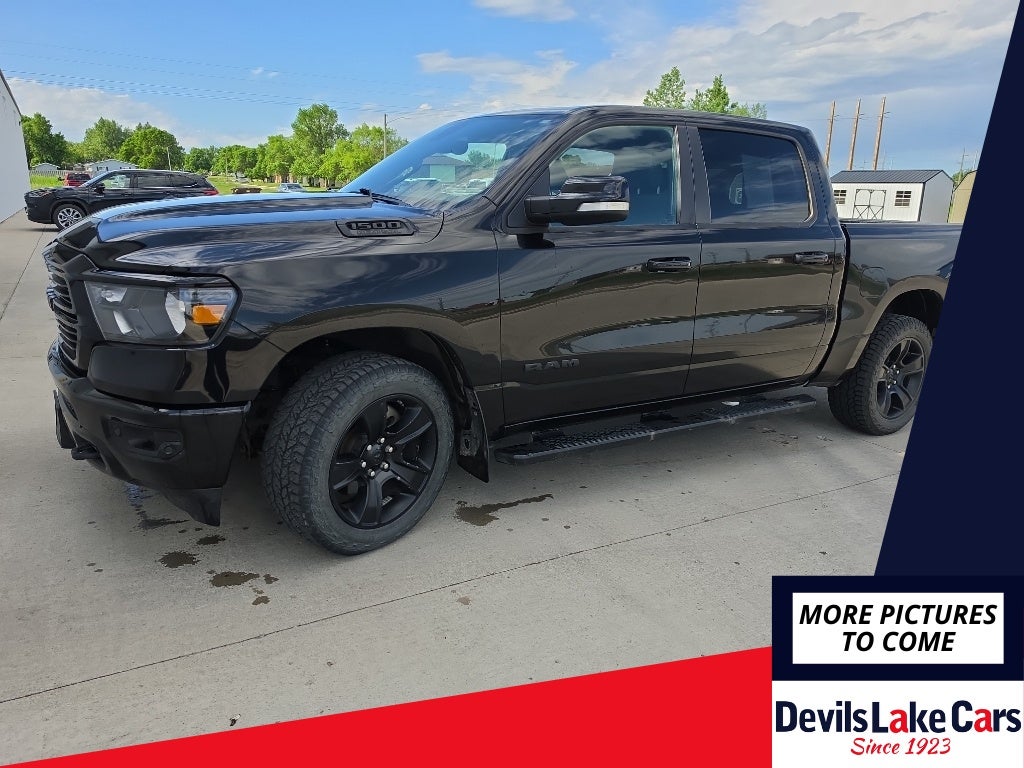 2020 RAM 1500 Big Horn in Black — front three-quarter view