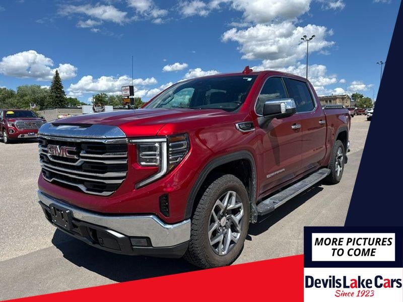 2025 GMC Sierra 1500 SLT in Volcanic Red Tintcoat — front three-quarter view