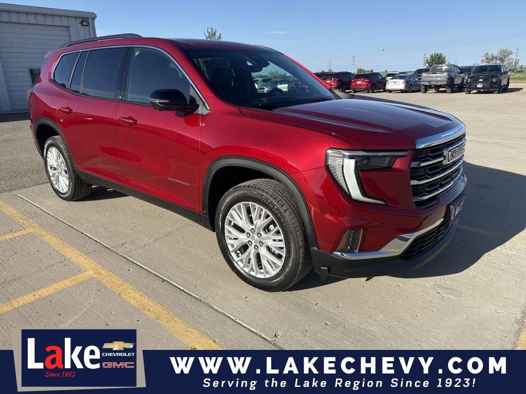 2026 GMC Acadia Elevation in Volcanic Red Tintcoat — front three-quarter view
